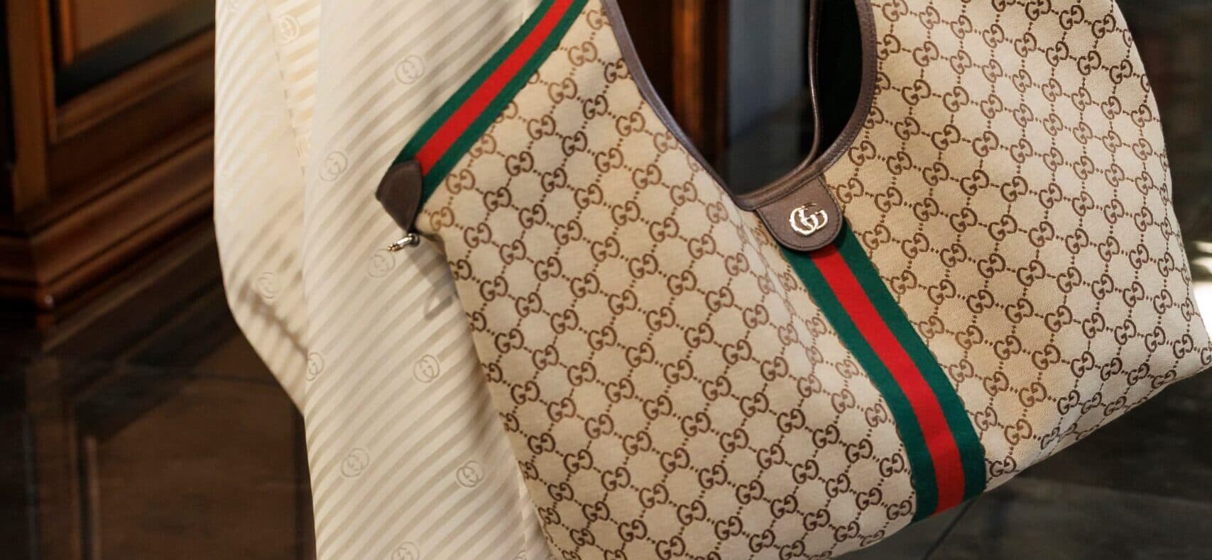 Gucci sänker priserna.
